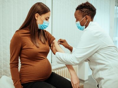 Covid vaccine uptake in pregnant women rises to 60% but racial inequalities persist