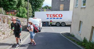 Comical moment Tesco lorry gets stuck trying to go round corner
