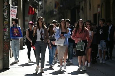 Mass tourism returns to Barcelona -- so does debate