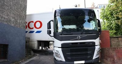 Tesco lorry wedges itself in street for 12 hours as even police rush to help
