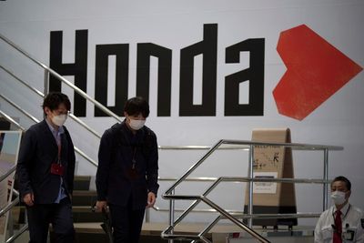 Japan's Honda sees profit slide on chips, material cost woes