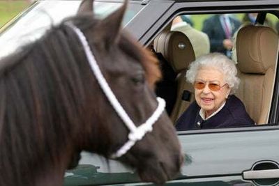 Relaxed Queen is all smiles as she attends Royal Windsor Horse Show