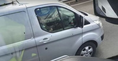 Woman filmed eating bowl of cereal doing 70MPH on a busy motorway