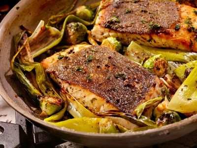 Let leeks shine with roasted fish and olive salsa verde