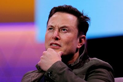 Elon Musk says deal to buy Twitter ‘temporarily on hold’