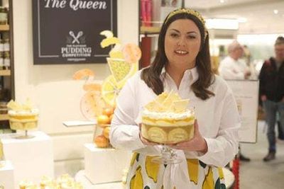 Platinum Pudding winner Jemma Melvin celebrates in Fortnum and Mason