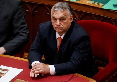 Hungary's Orban hands ex-aide, finance minister economic challenge