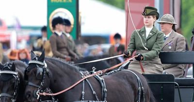 Proud Queen watches 'favourite granddaughter' Lady Louise as she rides Philip's carriage
