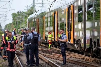 Five stabbed in German train attack as police probe extremist motive