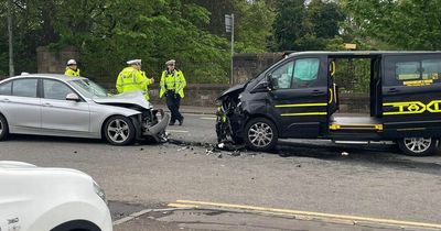 Emergency crews race to head-on smash between taxi and car in Glasgow