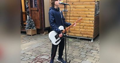 The 11-year-old who busks on Market Street and dreams of being 'the next Johnny Marr'