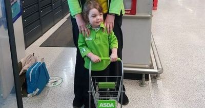 Young girl, 3, loves nothing more than helping Asda shoppers