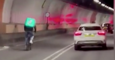 Deliveroo rider spotted cycling through Glasgow's Clyde tunnel by shocked car passenger