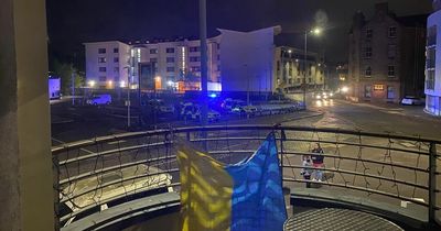 Edinburgh street swarmed by police as men with 'weapons' tried to get into flat