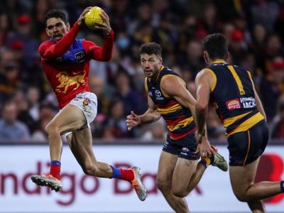 Cameron stars as Lions down Crows in AFL