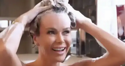 Amanda Holden strips off in bath and admits she has 'no plans to ditch racy outfits'