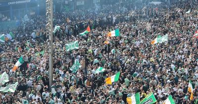 Thousands of Celtic fans descend on Glasgow Cross to celebrate title win