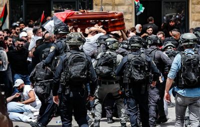 Israeli police investigate officers' use of force at a veteran journalist's funeral