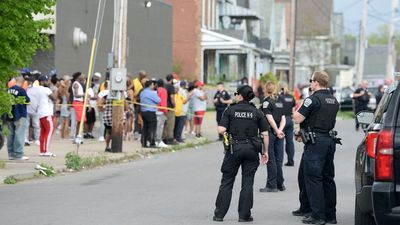 FBI director: Buffalo shooting an "act of racially motivated violent extremism"