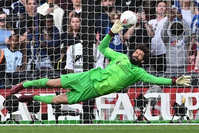 ‘Unbelievable human’ Alisson inspires Liverpool’s extraordinary journey for unlikely quadruple