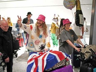 Sam Ryder celebrates as he arrives in UK following Eurovision triumph
