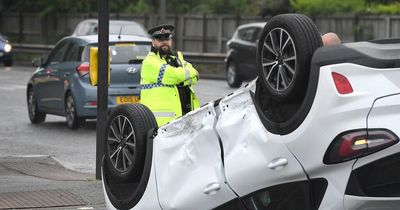 Car flips onto roof in Wigan crash