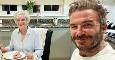 David Beckham tucks into mum's food as he cheekily takes aim at 'jealous' sisters