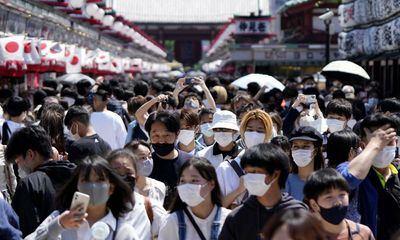 ‘We have to be careful’: why are masks still worn in Japan and South Korea?