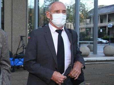 Wife 'cowered' by Dawson, trial told