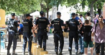 Rangers fans party in Seville under watchful eye of Spanish riot cops