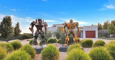 Bizarre mansion with huge Transformers statues 'standing guard' on market for £1.8m