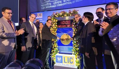 Business: LIC share lists at 8.11 per cent discount at Rs 872 on NSE