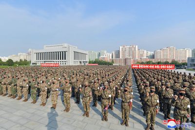 N Korea reports fever surge as military ramps up COVID response