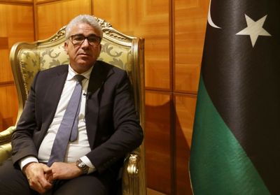 Clashes break out in Tripoli, drive rival Libyan PM away