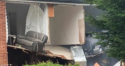 Explosion damage to Skelmersdale flats as walls blown apart and sofa falls out of home