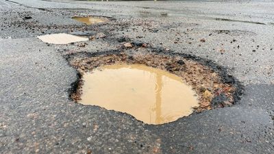 How your local garbage truck is helping fix south-east Queensland's pothole problems