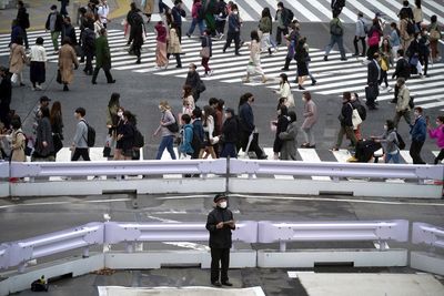 Japan's quarterly economy contracts as energy prices soar