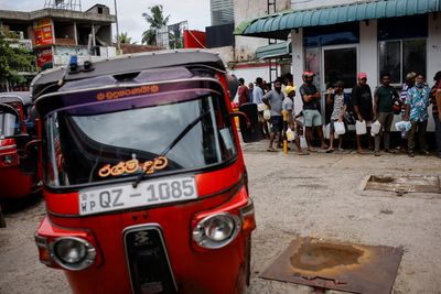 Sri Lanka to default on debt, no money for fuel, minister says
