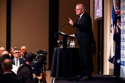 Australia PM bats away mounting Covid worries