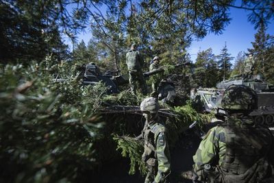 Finland, Sweden apply to join NATO as first Ukraine war crimes trial begins