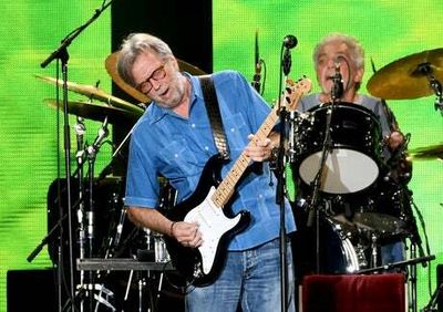 Vaccine sceptic Eric Clapton postpones gigs after getting Covid