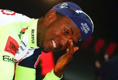 Biniam Girmay out of Giro d’Italia after being hit in eye by prosecco cork celebrating stage win