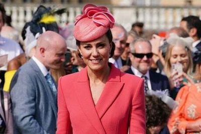 Duchess of Cambridge glows in pink as she stands in for Queen at Buckingham Palace garden party