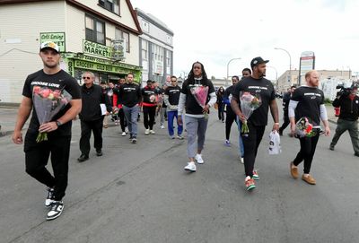 Bills coaches, players show up as a team to help Buffalo heal after mass shooting