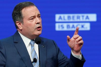 Alberta premier says he will step down after party leadership review