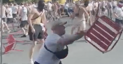 Rangers fans attacked by Eintracht Frankfurt thugs on streets of Seville in shocking video