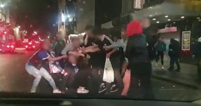 Rangers fans brawl in Glasgow after Europa League final loss to Eintracht Frankfurt as woman dragged across road by hair