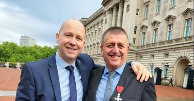 Covid port star celebrates MBE at Buckingham Palace with wife and boss