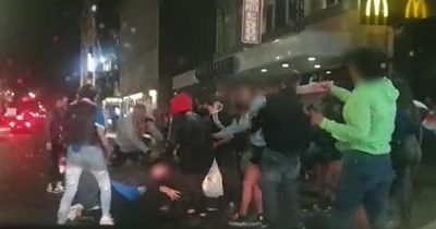 Rangers fans brawl on city centre road after Europa League final match
