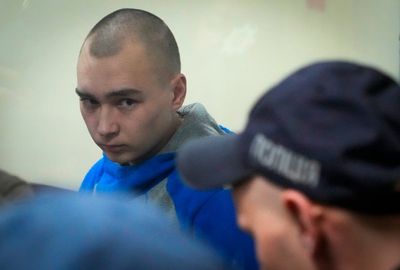 Russian soldier on trial asks victim's widow to forgive him